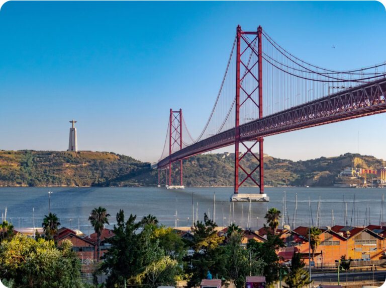 The 25 de Abril bridge over the Tagus in Lisbon, with the Cristo Rei statue on the far bank